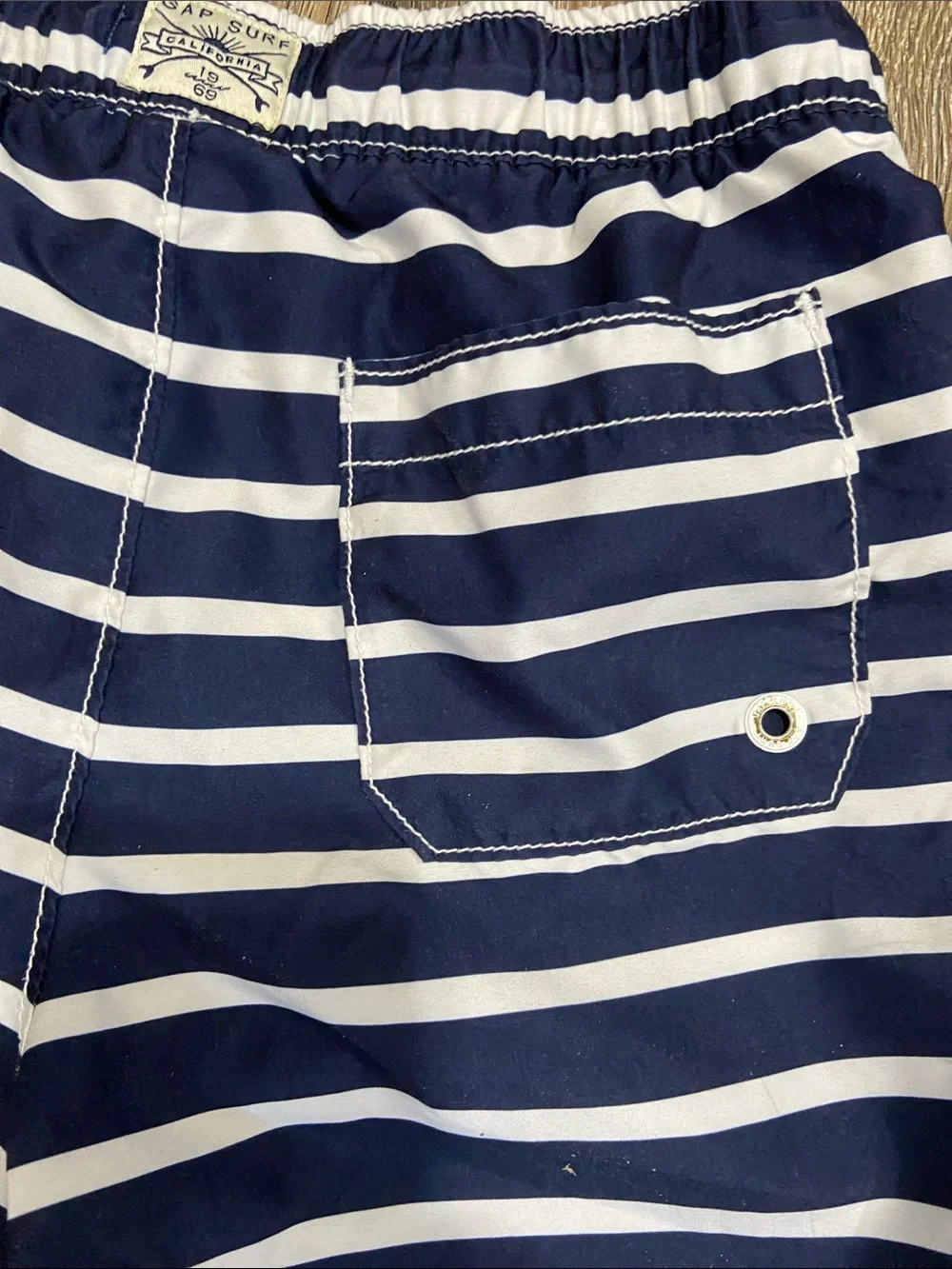 GAP Navy and White Striped Kids Swim Trunks with Orange Drawstring